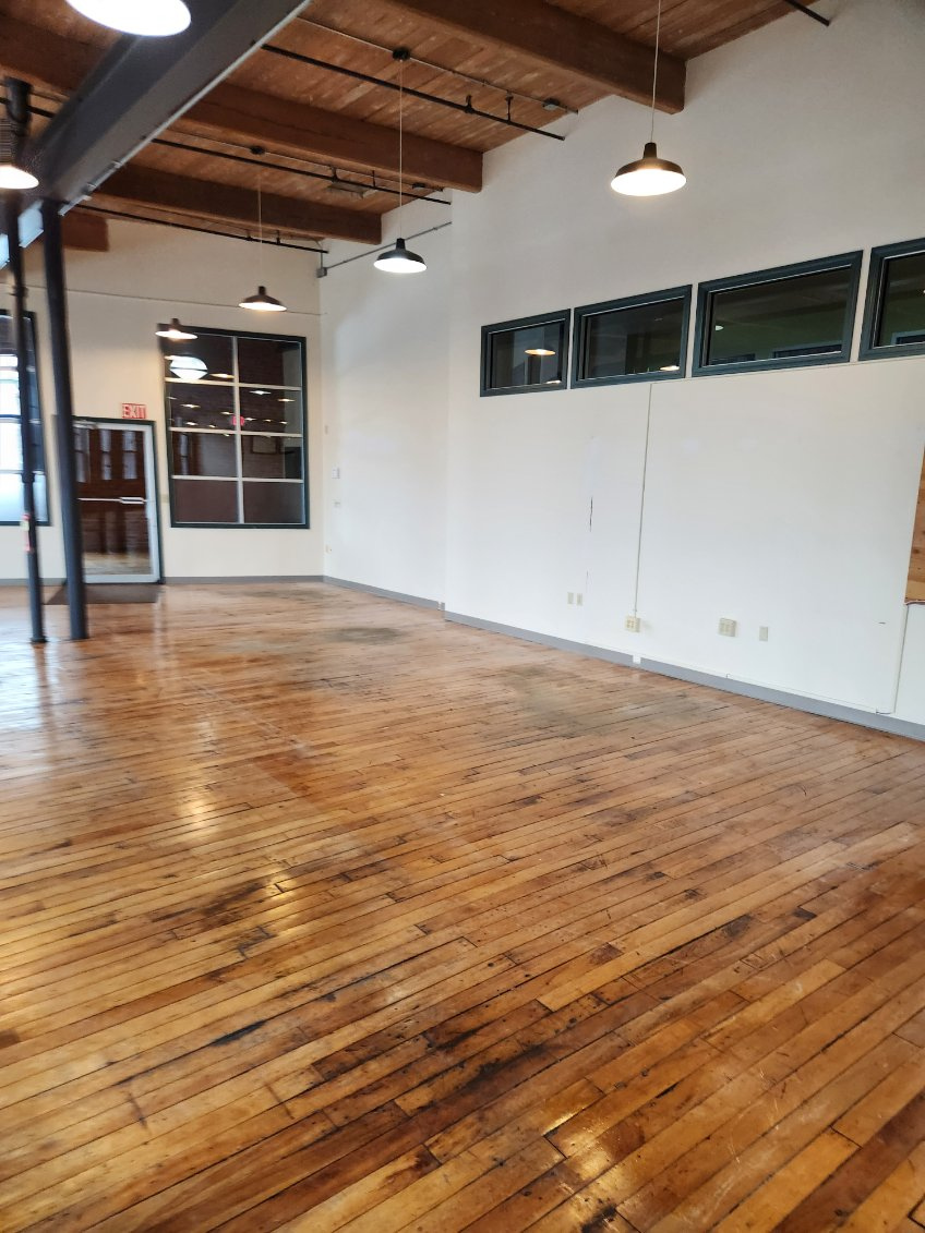Cleared office zone following removal of assigned furniture and excess items