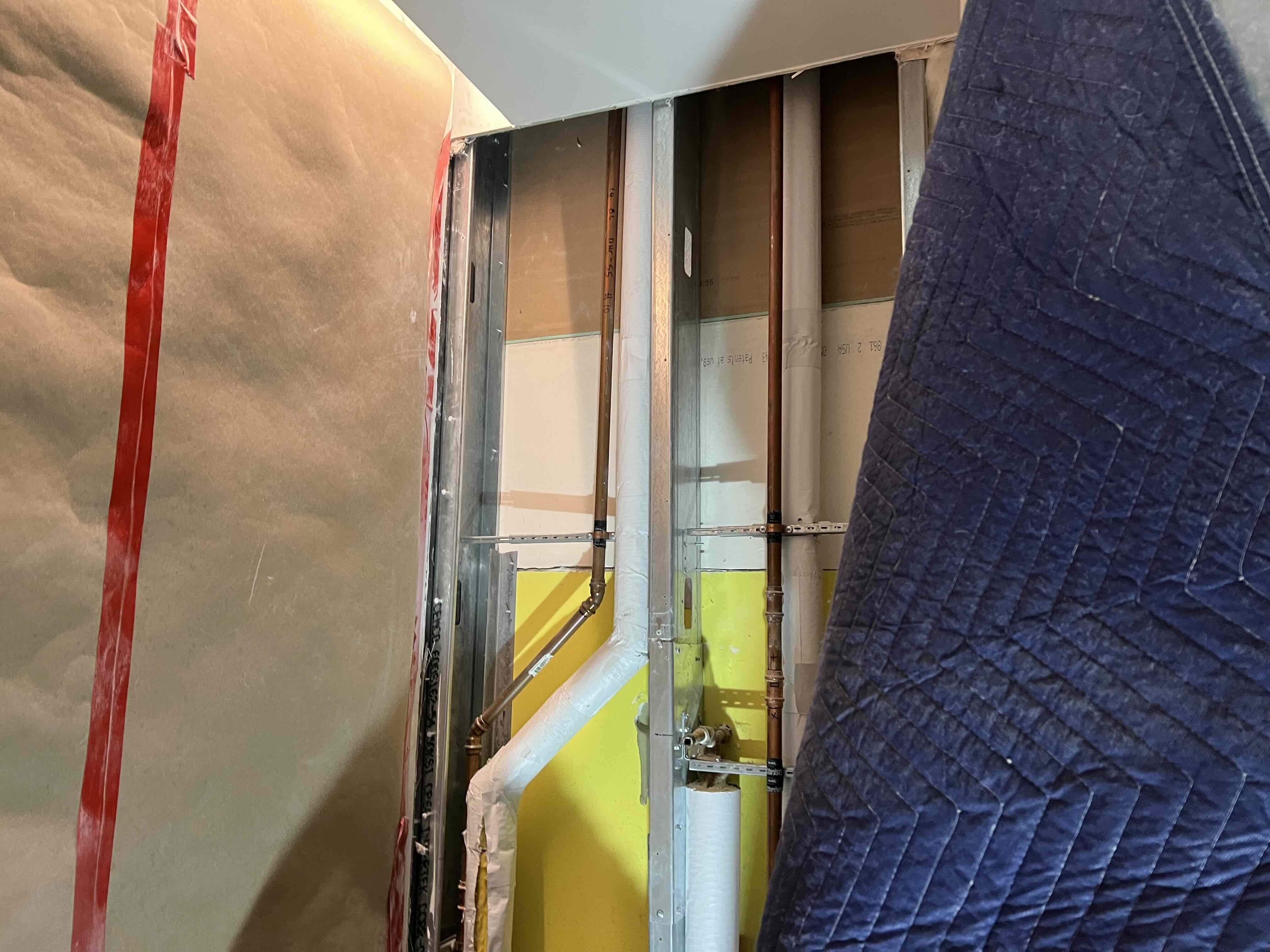 Protected wall opening