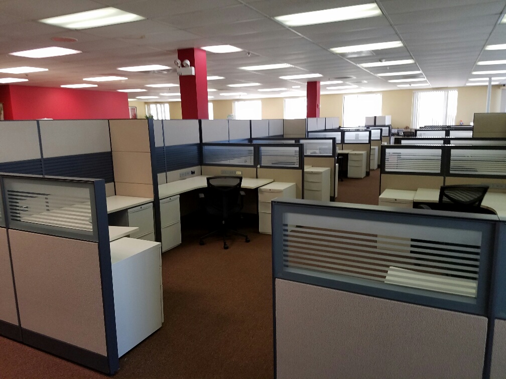 Completed Chicago office with reinstalled workstations, chairs, and clear aisles