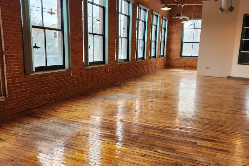 Cleared Northampton office with brick walls and timber floors