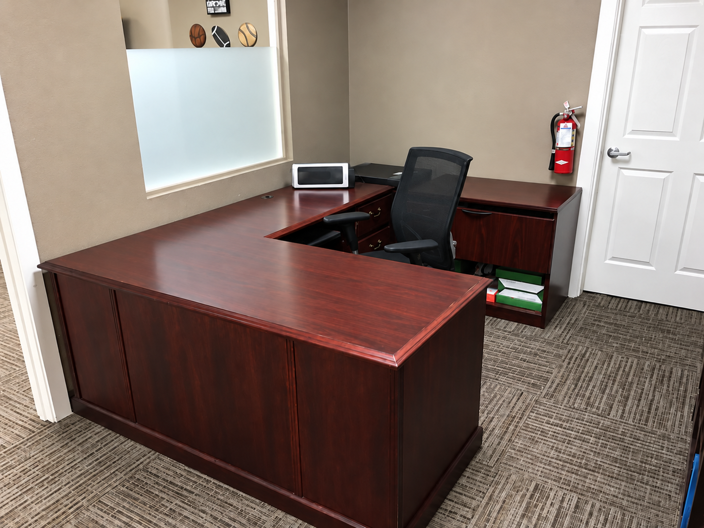 First American Title Albany private-office furniture return, completed desk arrangement